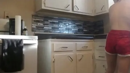 Tattooed redhead gets a good fucking in the kitchen solo