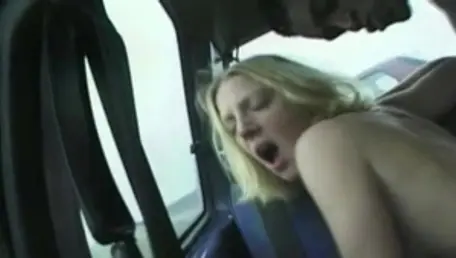 Young british slut wanking in a car