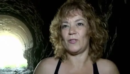 Curvy MILF fingering in public