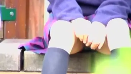 Two Cute Asian Babes Sitting Upskirt Exposure