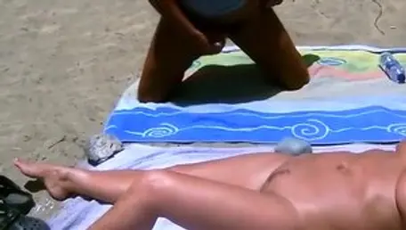 Naked MILF masturbating in the bath