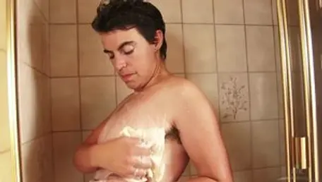Aunt Judy's - Rides a hard dick in the bath in HD